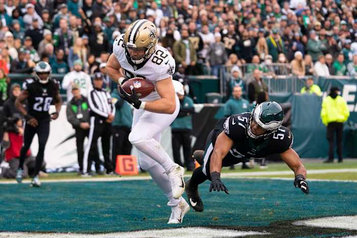 New Orleans Saints tight end Adam Trautman (82) makes a touchdown catch past Eagles linebacker T.J. Edwards (57). Mandatory Credit: Bill Streicher-USA TODAY Sports